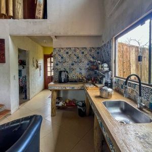 Casa com 80m², 2 dormitórios, 2 vagas no bairro Vila São João em Torres para Comprar