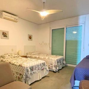 Casa de Condomínio com 338m², 4 dormitórios, 3 suítes, 2 vagas no Ocean Side em Torres para Comprar