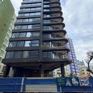 Apartamento com 122m², 3 dormitórios, 3 suítes, 2 vagas no Taos Residence em Torres para Comprar
