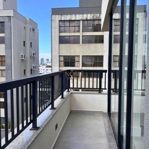 Apartamento com 64m², 2 dormitórios, 1 suíte, 1 vaga no Aston em Torres para Comprar
