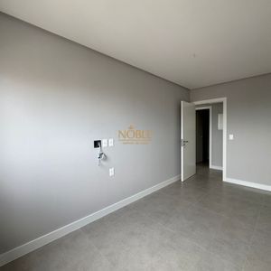 Apartamento com 102m², 3 dormitórios, 1 suíte, 2 vagas no Maui Residencial em Torres para Comprar