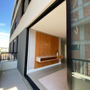 Apartamento com 60m², 2 dormitórios, 1 suíte, 1 vaga no Aston em Torres para Comprar