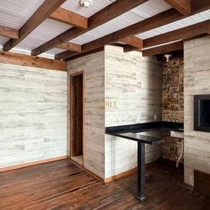 Casa com 130m², 2 dormitórios, 2 vagas no bairro Praia da Cal em Torres para Comprar