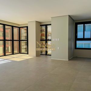Apartamento com 119m², 3 dormitórios, 1 suíte, 2 vagas no Titanium em Torres para Comprar