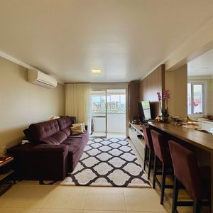 Apartamento com 90m², 2 dormitórios, 1 suíte, 1 vaga no Edifício San Dilin em Torres para Comprar