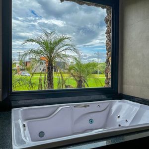 Casa de Condomínio com 250m², 4 dormitórios, 4 suítes, 2 vagas no Reserva das Águas em Torres para Comprar