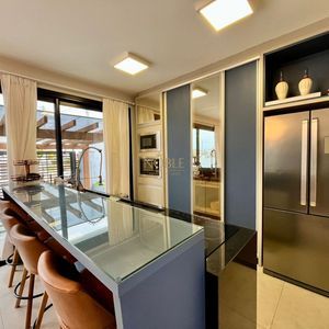 Casa com 670m², 5 dormitórios, 3 suítes, 3 vagas no bairro Bellatorres em Passo de Torres para Comprar