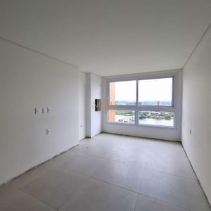 Apartamento com 69m², 2 dormitórios, 1 suíte, 1 vaga no Giardino em Torres para Comprar