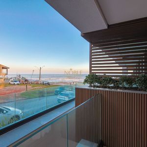 Apartamento com 87m², 2 dormitórios, 2 suítes, 2 vagas no Aura em Torres para Comprar