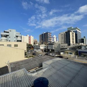 Casa com 500m², 7 dormitórios, 2 suítes, 2 vagas no bairro Centro em Torres para Comprar