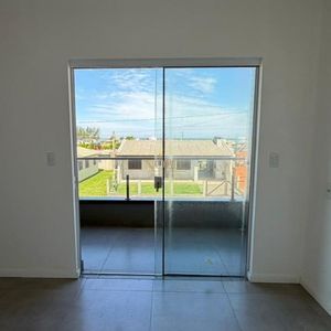 Sobrado com 148m², 3 dormitórios, 1 suíte, 2 vagas no bairro Tapera em Passo de Torres para Comprar