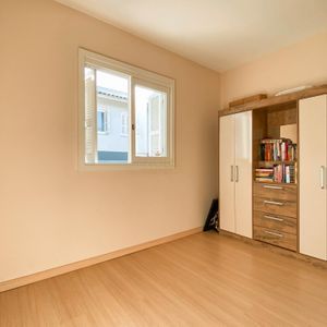 Sobrado com 54m², 2 dormitórios, 1 vaga no Residencial Bela Vista em Torres para Comprar