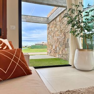 Casa de Condomínio com 201m², 3 dormitórios, 3 suítes, 3 vagas no Reserva das Águas em Torres para Comprar