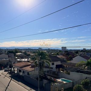 Apartamento com 83m², 2 dormitórios, 1 suíte, 2 vagas no Bellagio Residenziale em Torres para Comprar