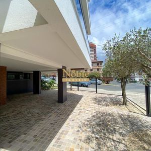 Apartamento com 71m², 2 dormitórios, 1 suíte, 2 vagas no Residencial DI Capri em Torres para Comprar