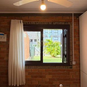 Casa com 98m², 3 dormitórios, 2 vagas no bairro Praia da Cal em Torres para Comprar