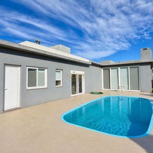 Casa de Condomínio com 233m², 3 dormitórios, 3 suítes, 2 vagas no Reserva das Águas em Torres para Comprar