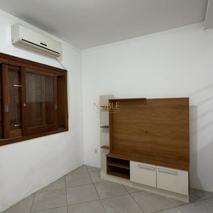 Geminado com 60m², 2 dormitórios, 1 vaga no bairro Morada das Palmeiras em Torres para Comprar