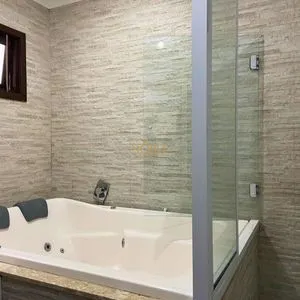 Casa com 148m², 3 dormitórios, 1 suíte, 2 vagas no bairro Morada das Palmeiras em Torres para Comprar