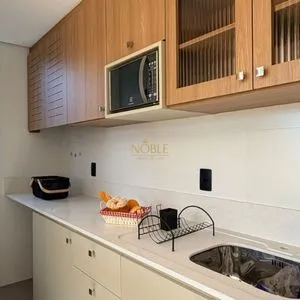 Apartamento com 64m², 2 dormitórios, 1 suíte, 1 vaga no Aston em Torres para Comprar