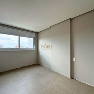 Apartamento com 72m², 2 dormitórios, 1 suíte, 1 vaga no Topazio em Torres para Comprar