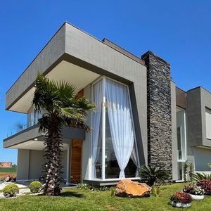 Casa de Condomínio com 312m², 4 dormitórios, 4 suítes, 4 vagas no Reserva das Águas em Torres para Comprar