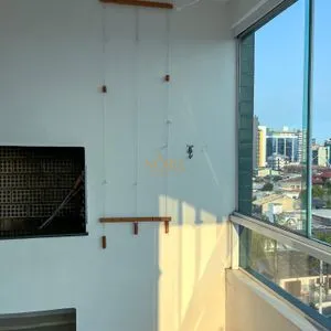 Apartamento com 72m², 2 dormitórios, 1 vaga no Residencial das Palmeiras em Torres para Comprar