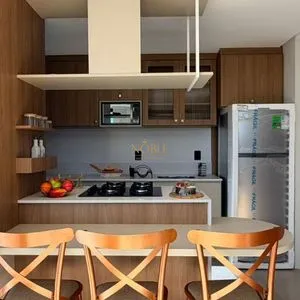 Apartamento com 64m², 2 dormitórios, 1 suíte, 1 vaga no Aston em Torres para Comprar