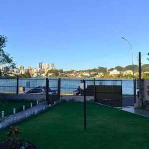 Casa com 243m², 4 dormitórios, 1 suíte, 2 vagas no bairro Stan em Torres para Comprar