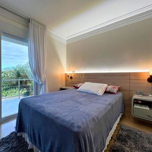 Casa com 600m², 4 dormitórios, 1 suíte, 4 vagas no bairro Igra Norte em Torres para Comprar