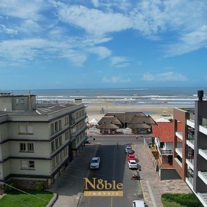 Apartamento com 108m², 3 dormitórios, 1 suíte, 2 vagas no Residencial DI Capri em Torres para Comprar