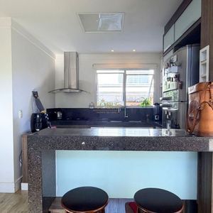 Casa com 400m², 5 dormitórios, 1 suíte, 4 vagas no bairro Stan em Torres para Comprar