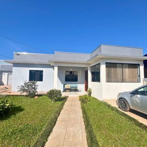 Casa, 3 dormitórios, 1 suíte, 2 vagas no bairro Igra Sul em Torres para Comprar