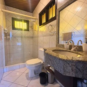 Casa, 3 dormitórios, 1 suíte, 2 vagas no bairro Itapeva Norte em Torres para Comprar