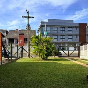 Casa com 98m², 3 dormitórios, 2 vagas no bairro Praia da Cal em Torres para Comprar