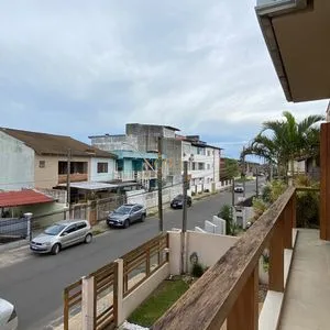 Casa com 272m², 4 dormitórios, 1 suíte, 3 vagas no bairro Igra Norte em Torres para Comprar