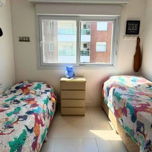 Apartamento com 101m², 2 dormitórios, 2 suítes, 2 vagas no Belize em Torres para Comprar