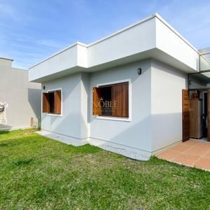Casa com 100m², 2 dormitórios, 1 suíte, 2 vagas no bairro Bella Torres em Passo de Torres para Comprar