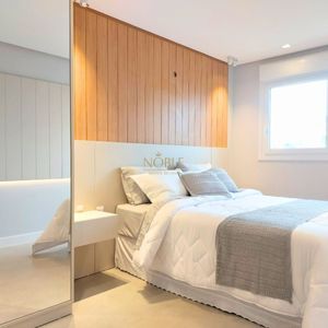 Apartamento com 102m², 3 dormitórios, 1 suíte, 2 vagas no Maui Residencial em Torres para Comprar