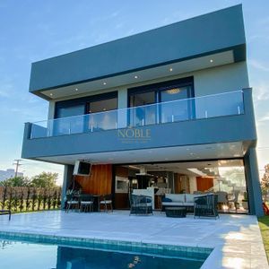 Casa de Condomínio com 375m², 4 dormitórios, 4 suítes, 2 vagas no Condomínio Ilhas Park em Torres para Comprar