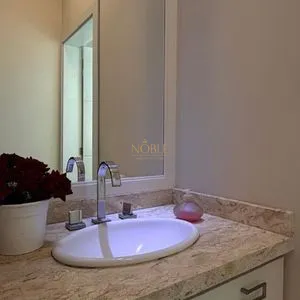 Casa com 243m², 4 dormitórios, 1 suíte, 2 vagas no bairro Stan em Torres para Comprar