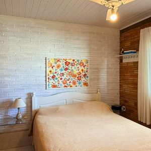 Casa com 98m², 3 dormitórios, 2 vagas no bairro Praia da Cal em Torres para Comprar