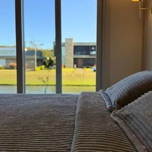Casa de Condomínio com 206m², 4 dormitórios, 4 suítes, 2 vagas no Reserva das Águas em Torres para Comprar