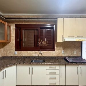 Casa com 420m², 5 dormitórios, 3 suítes, 1 vaga no bairro Centro em Torres para Comprar