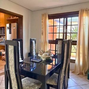 Casa, 6 dormitórios, 1 suíte, 4 vagas no bairro Stan em Torres para Comprar