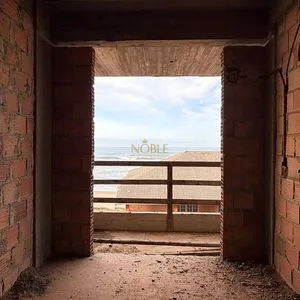 Apartamento com 85m², 2 dormitórios, 1 suíte, 1 vaga no Pescador em Passo de Torres para Comprar