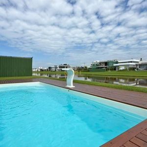 Casa de Condomínio com 417m², 4 dormitórios, 4 suítes, 2 vagas no Reserva das Águas em Torres para Comprar