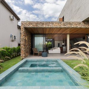 Casa de Condomínio com 244m², 4 dormitórios, 4 suítes, 2 vagas no Condomínio Ilhas Park em Torres para Comprar