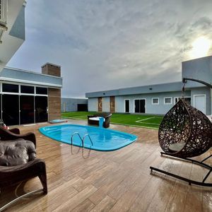 Casa com 670m², 5 dormitórios, 3 suítes, 3 vagas no bairro Bellatorres em Passo de Torres para Comprar