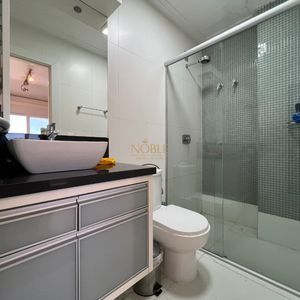 Casa com 600m², 4 dormitórios, 1 suíte, 4 vagas no bairro Igra Norte em Torres para Comprar